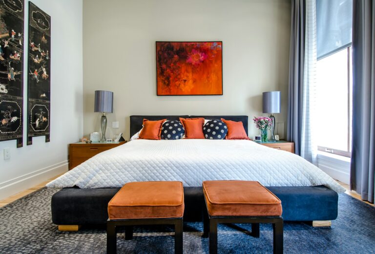 Neutral morning-light bedroom with a made bed, honest and reflective mood, representing a considered mattress verdict